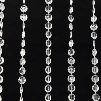 Crystal bead curtain strands on a black background.