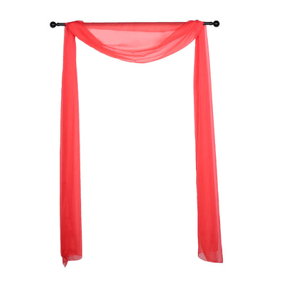 Red chiffon drapery on a rod, ideal for event decoration.