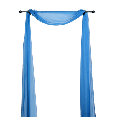 Blue sheer fabric draped elegantly on a curtain rod.