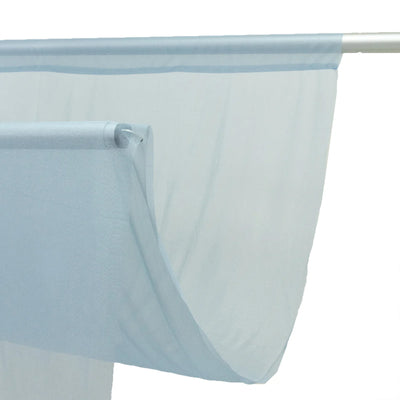 Light blue sheer curtain panel on a metal rod, close-up view