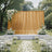 Outdoor wedding ceremony setup with gold backdrop, white flowers, and aisle petals