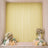 Elegant pastel wedding backdrop with floral arrangements, candles, and balloons