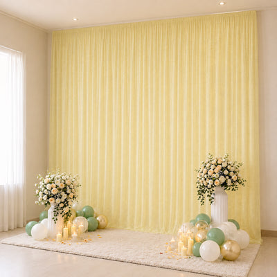 Elegant pastel floral backdrop with balloons and candles for event decor