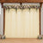 Floral wedding backdrop with wood frame and ivory drapes