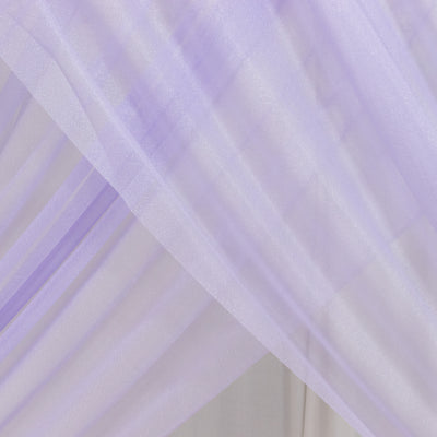 Sheer lavender fabric draping elegantly in soft folds.