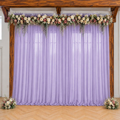 Lavender wedding backdrop with floral garland and rustic wooden frame