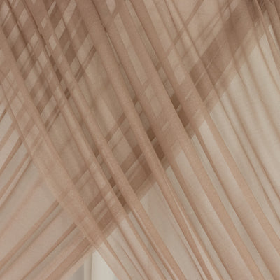 Sheer brown curtains with soft, flowing drapes and layered texture. #whtbkgd
