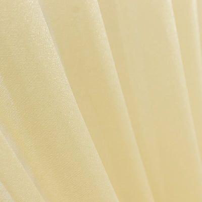 Close-up of textured yellow fabric with pleats and sheen. #whtbkgd