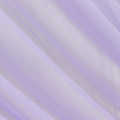 Soft lavender fabric with shimmering texture and flowing drapes.