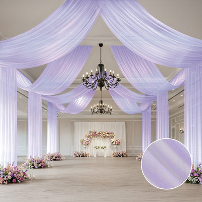 Elegant purple drapery in a beautifully decorated event space.