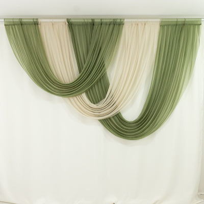 Green and cream draped sheer curtains on a white backdrop. 