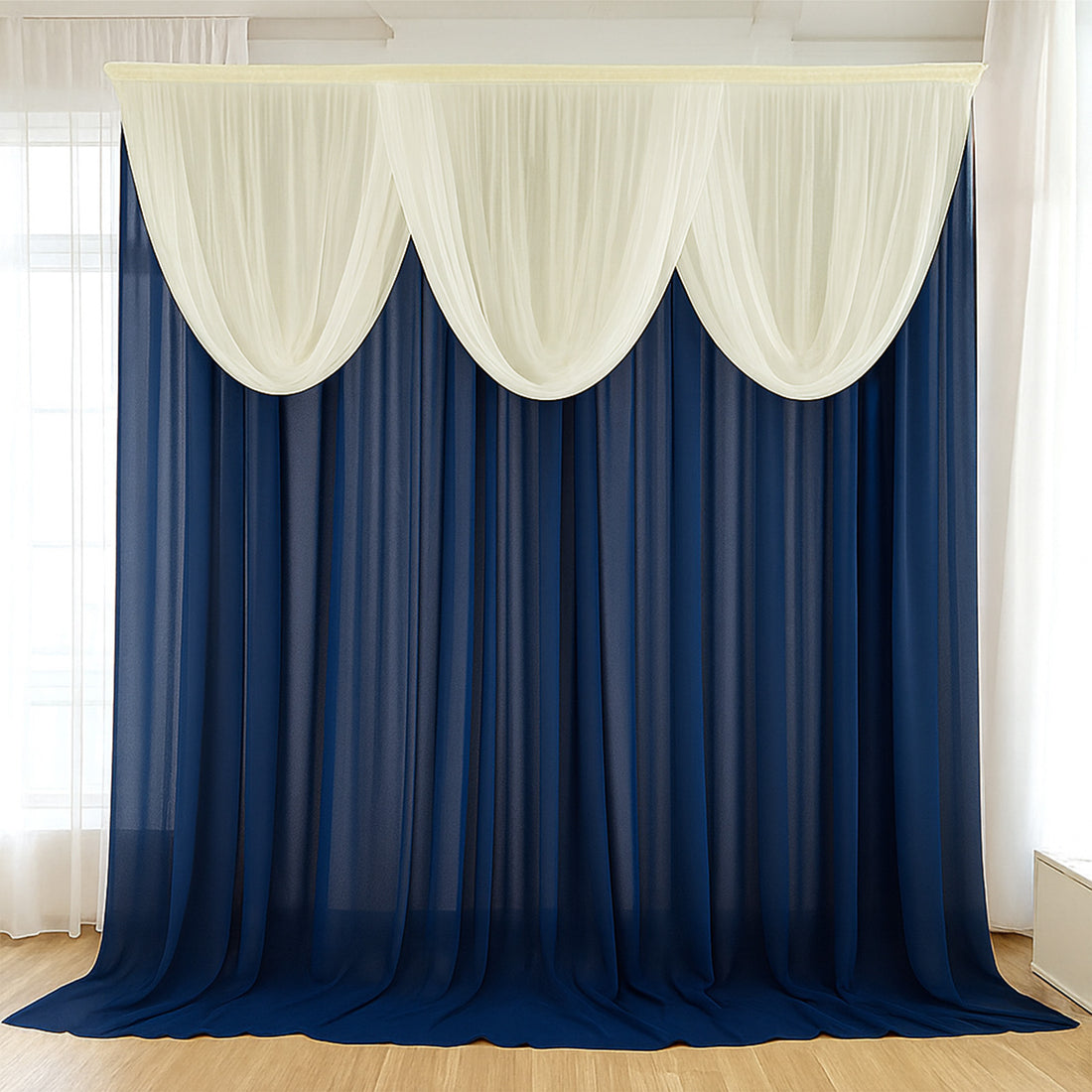 Navy and ivory layered curtains in a bright room
