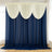 Navy and ivory layered curtains in a bright room