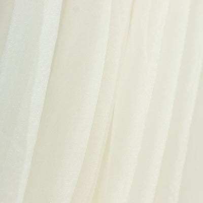 Sheer white fabric draped elegantly, showcasing delicate texture and flow.