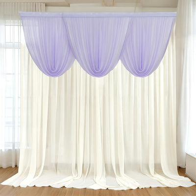 Lavender sheer curtain swag over white drapes in a bright room