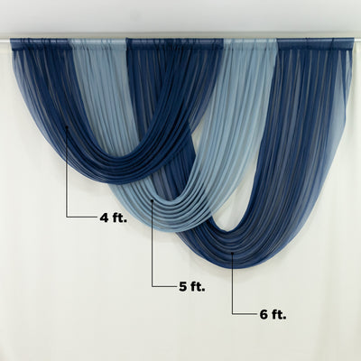 Elegant blue and navy drapery in a studio setting.