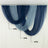 Elegant blue and navy drapery in a studio setting.
