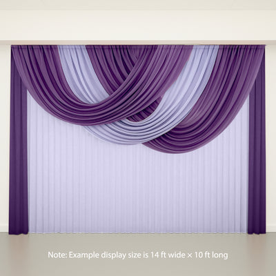 Purple and lavender drapery display, showcasing elegant fabric arrangement.
