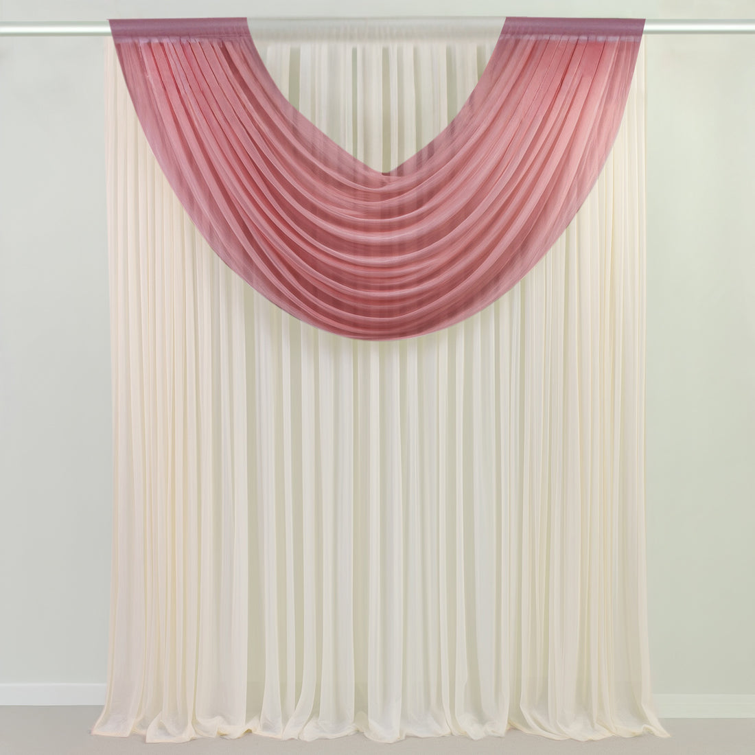 Ombre draped curtain in soft pink and cream tones 