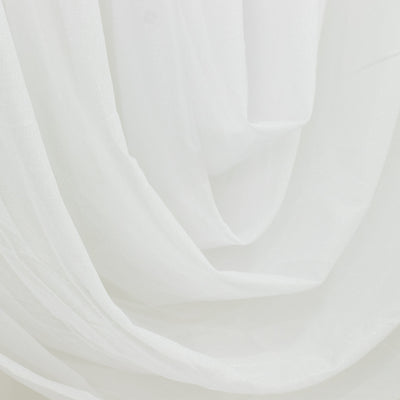 White sheer curtain fabric close-up