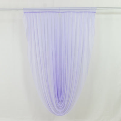 Lavender sheer curtain panel hanging from rod