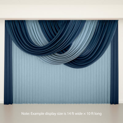 Elegant blue and navy draped curtains in a staged display setting.