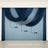 Elegant blue and navy draped curtains in a staged display setting.