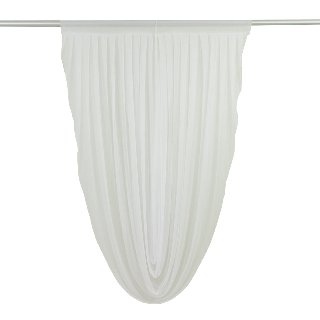 White sheer drapery fabric in a flowing design 