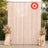 Elegant cream wedding backdrop with floral arrangements and candles, flame retardant