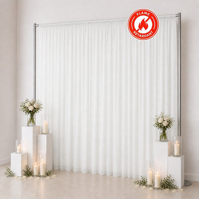 White flame-retardant wedding backdrop curtain with candles and floral decor