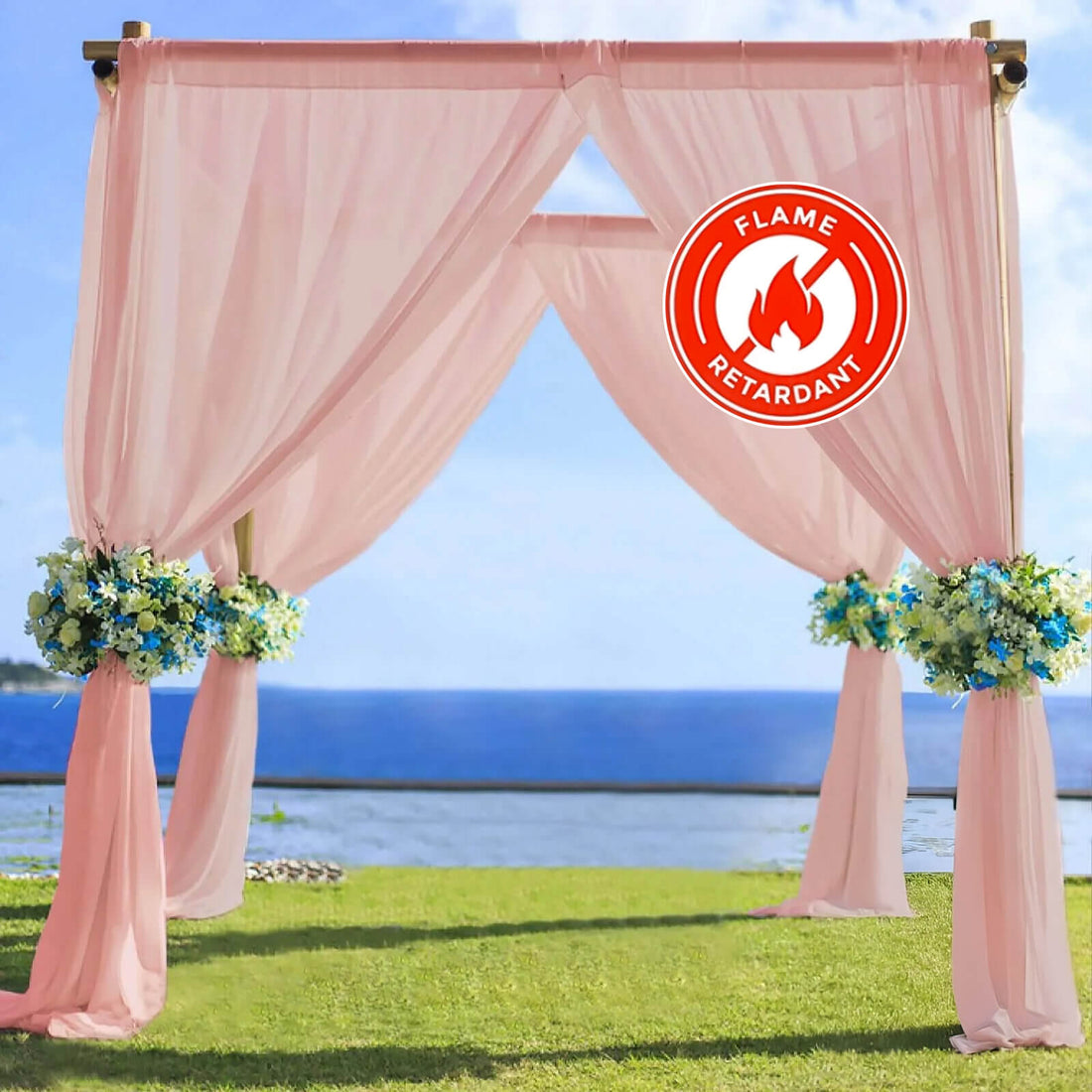 Flame-retardant wedding arch draped with pink fabric and floral accents.