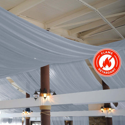 Flame-retardant sheer drapery fabric hanging from the ceiling