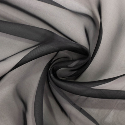 Black sheer fabric with a flowing, textured appearance.