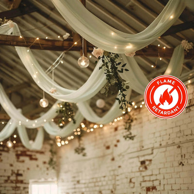 Flame retardant drapery with fairy lights for event decor.