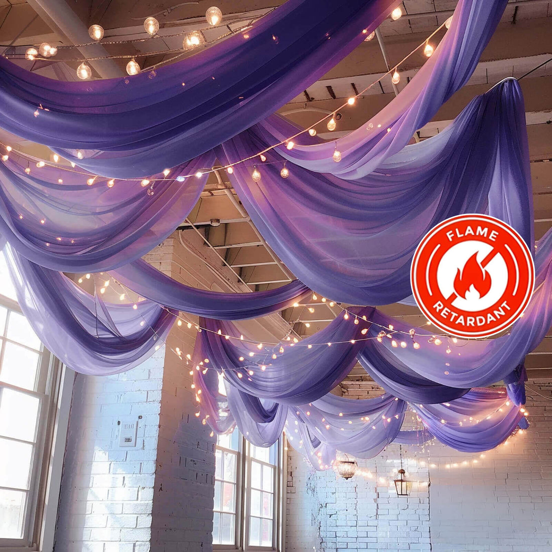 Purple sheer drapes with string lights in a decorative indoor setting.