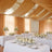 Elegant wedding reception with floral centerpieces and draped fabric decor.