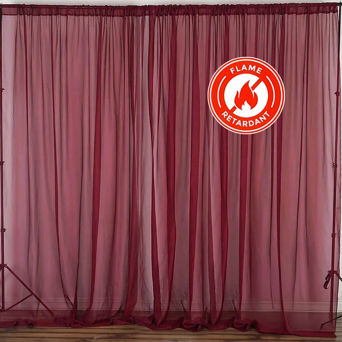 Flame retardant sheer curtains in burgundy color on a backdrop. #whtbkgd