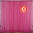 Flame retardant pink backdrop curtain for events and photography.