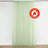 Flame retardant sheer curtain in light green hanging from a rod.