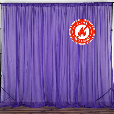 Purple flame-retardant curtain on display with a bold safety icon. #whtbkgd