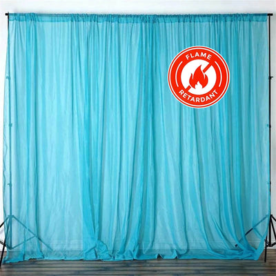 Flame retardant turquoise curtain on display
