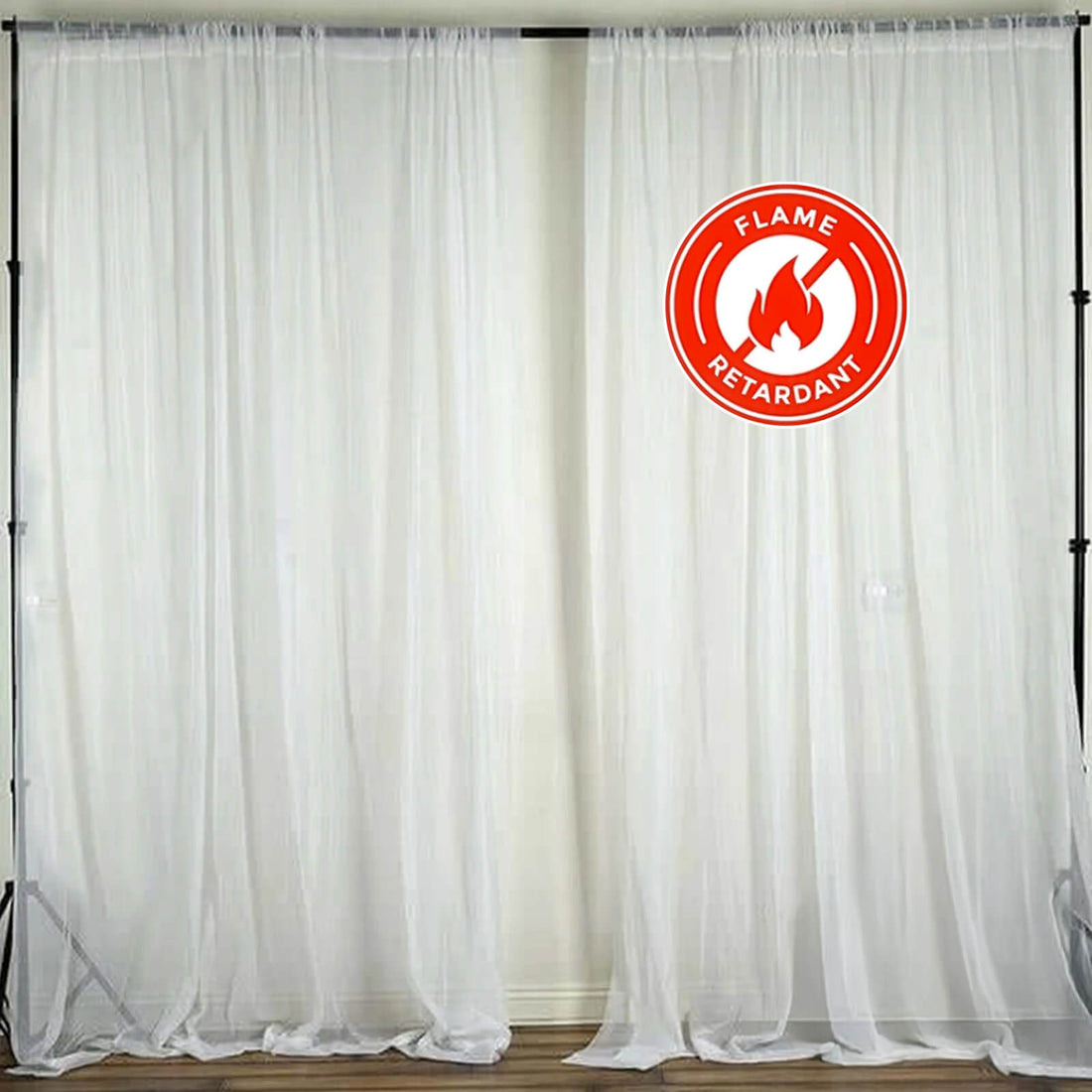 Flame-retardant sheer curtains on a backdrop.