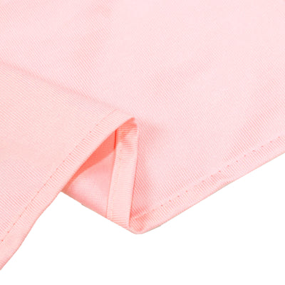 Light pink knit fabric close-up with stitched hem detail