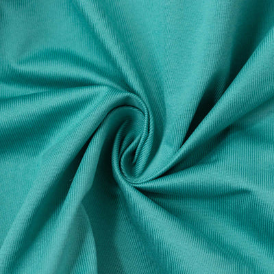 Turquoise knit fabric texture with swirling folds#whtbkgd
