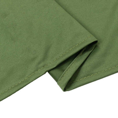 Olive green ribbed knit fabric folded close-up with stitched hem