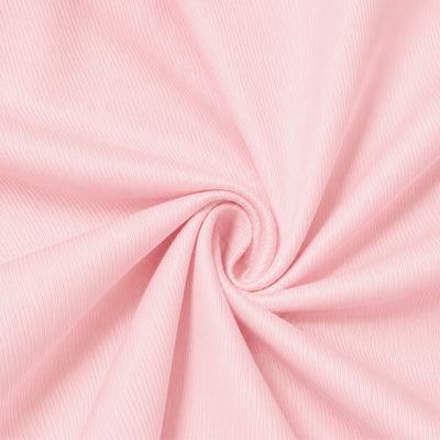 Soft pink fabric swirl texture background, elegant abstract textile close-up