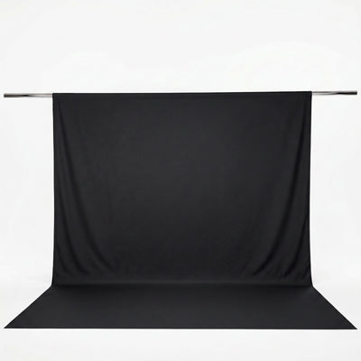 Black photography backdrop with support rod on white background#whtbkgd