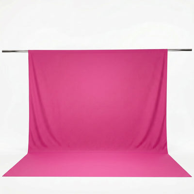 Pink seamless photography backdrop on studio support rod#whtbkgd