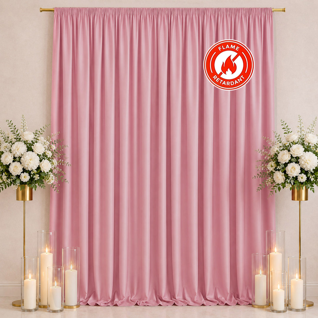 Pink flame retardant curtain backdrop with floral stands and candles