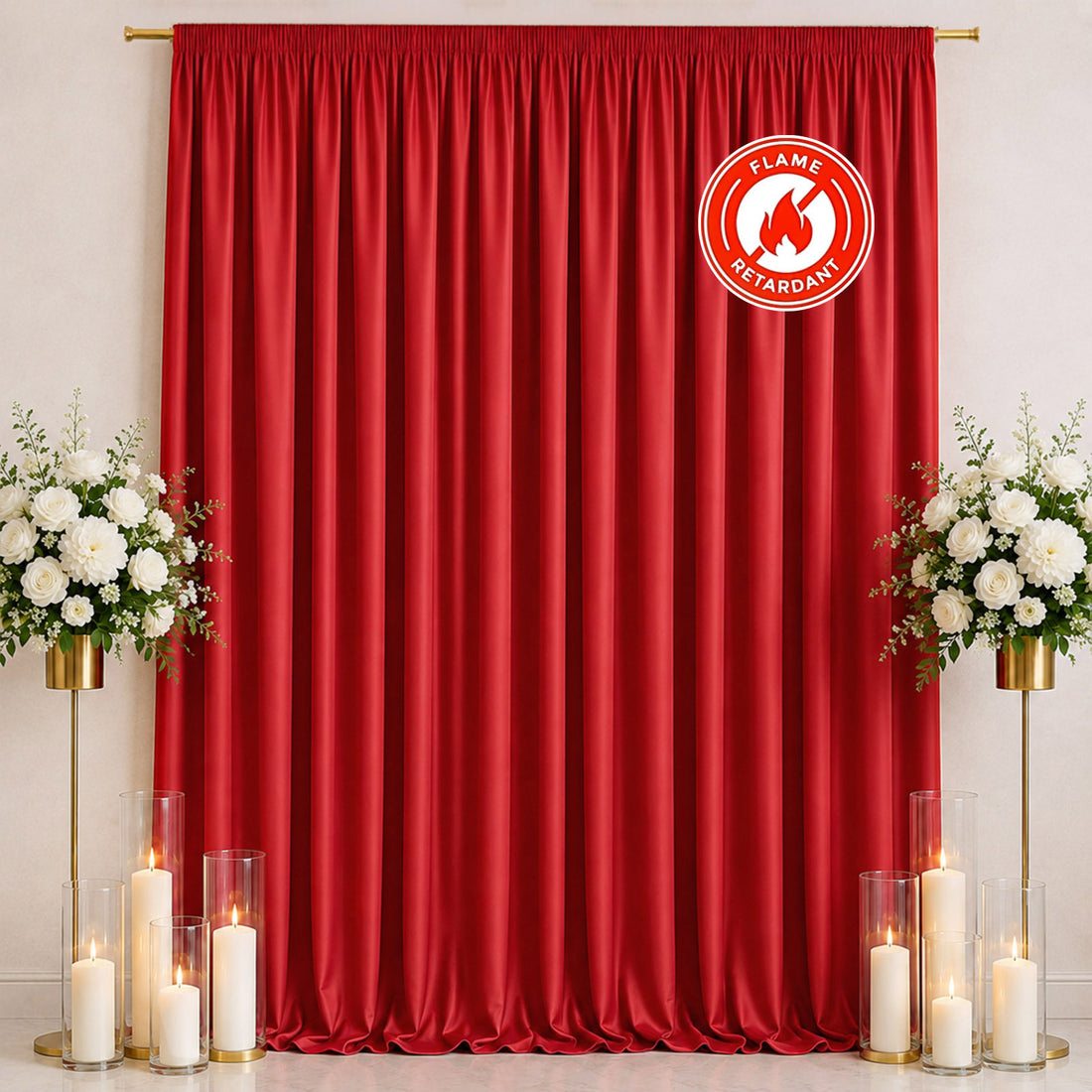 Red fire-retardant curtain backdrop with floral stands and candles